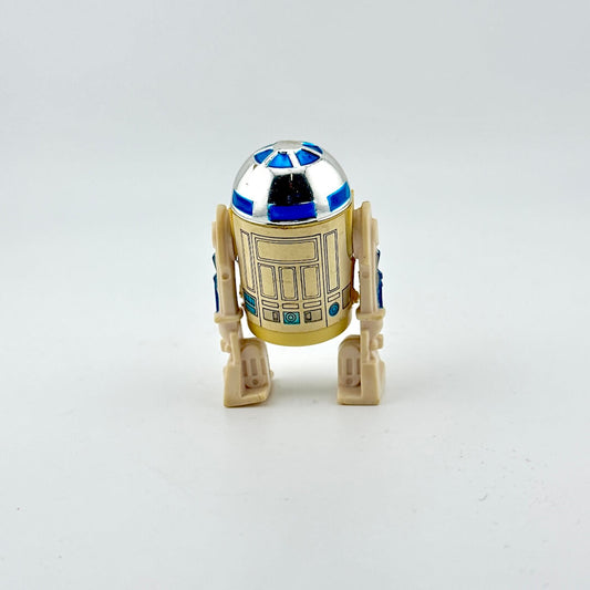 Toy robot resembling R2-D2 from Star Wars on a white background