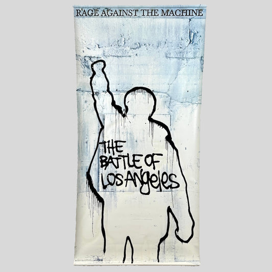 Poster of 'The Battle of Los Angeles' by Rage Against the Machine with a stylized figure and abstract design.