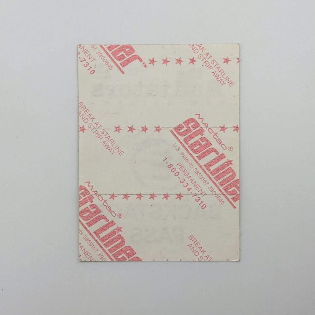 Reverse side of pass to show still attached paper backing and lack of damage.