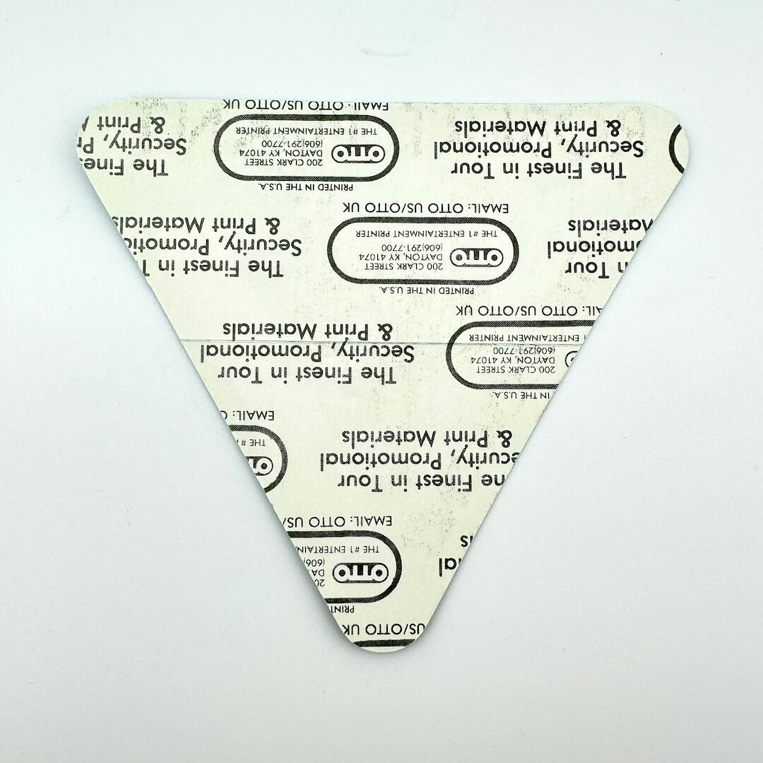 Triangular pass with printed text on intact backing on a white background.