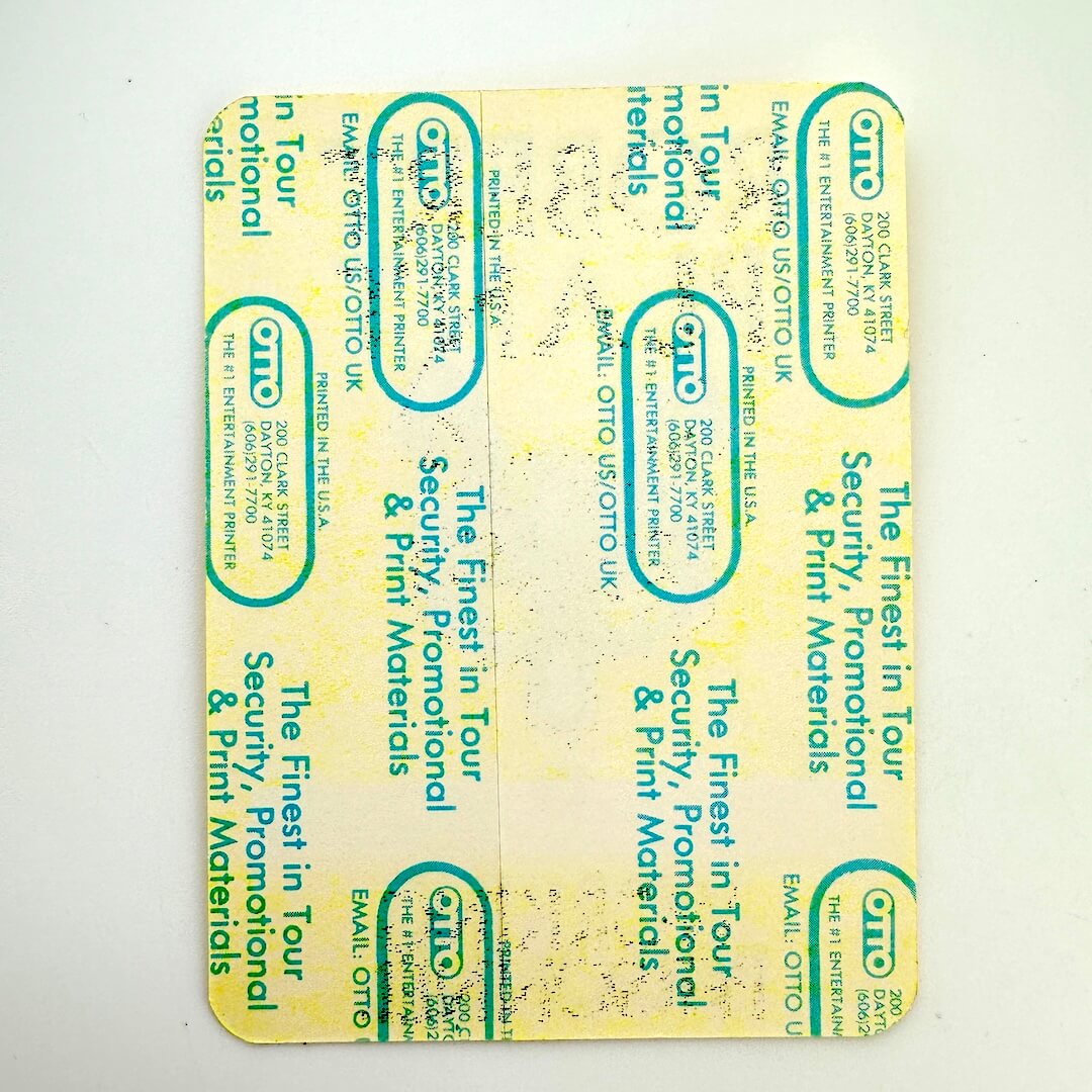 Backside of sticker showing manufacturing company information.