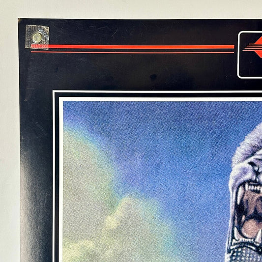 Top left corner of poster with some light scratches.