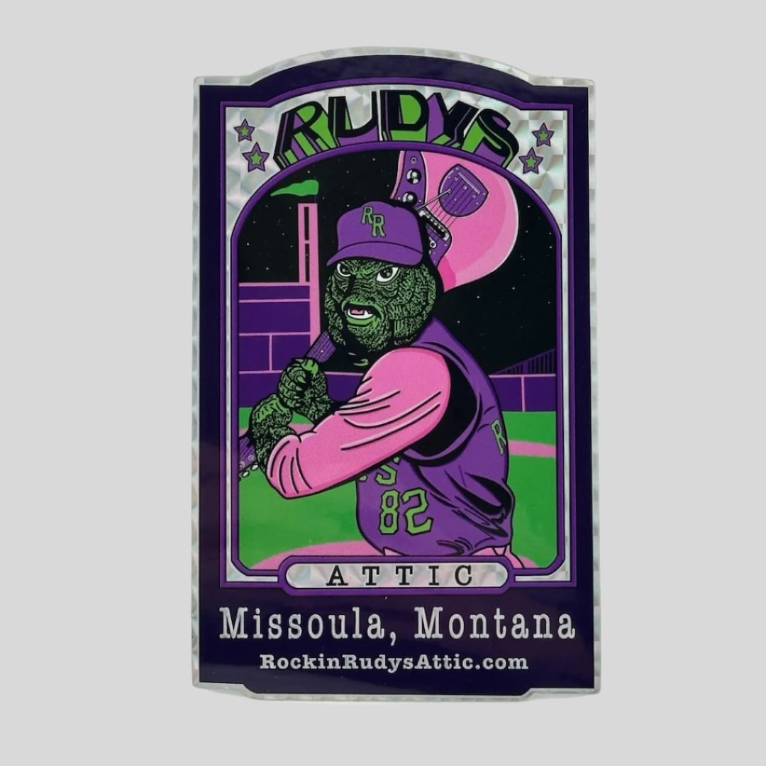 Classic baseball card design featuring uniform clad lizard person swinging guitar in stadium. Store info at bottom.