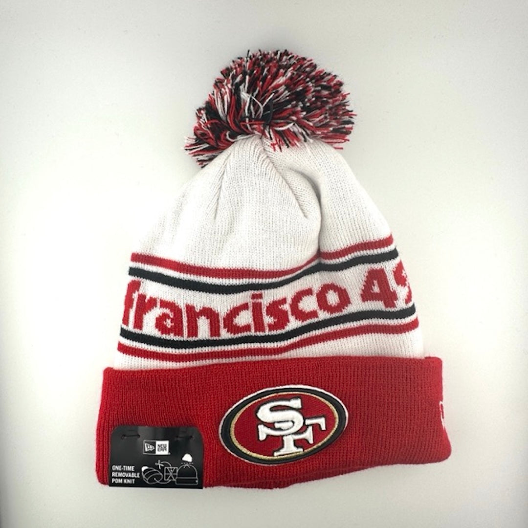 White knit cap with red/black stripes around red team name, 49ers logo in center of red cuff & red/black/white pom atop