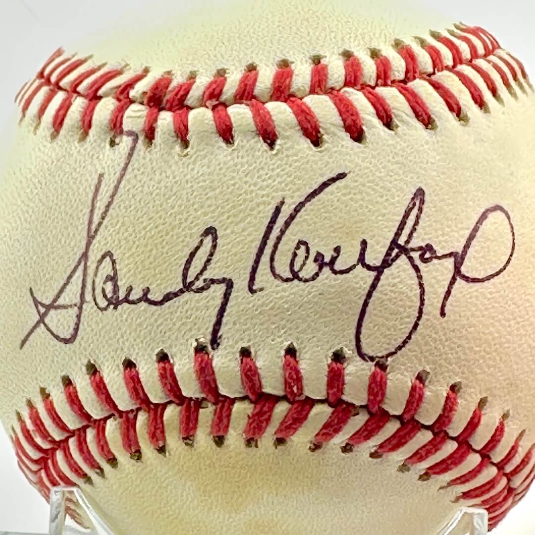 Close up of black pen signature across sweet spot.