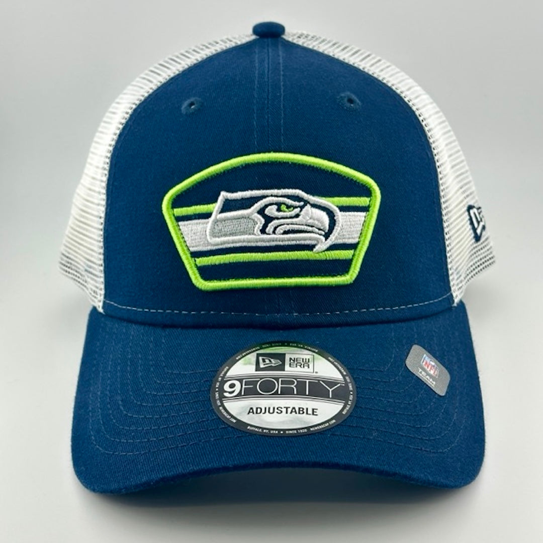 Baseball cap with white plastic mesh back, navy brim & face with Seahawks logo in center. New Era logo on left side.
