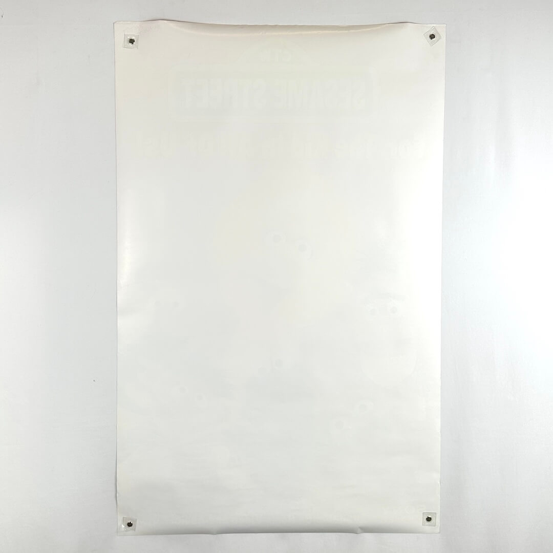 Backside of poster showing no damage to face and some edge wear throughout.