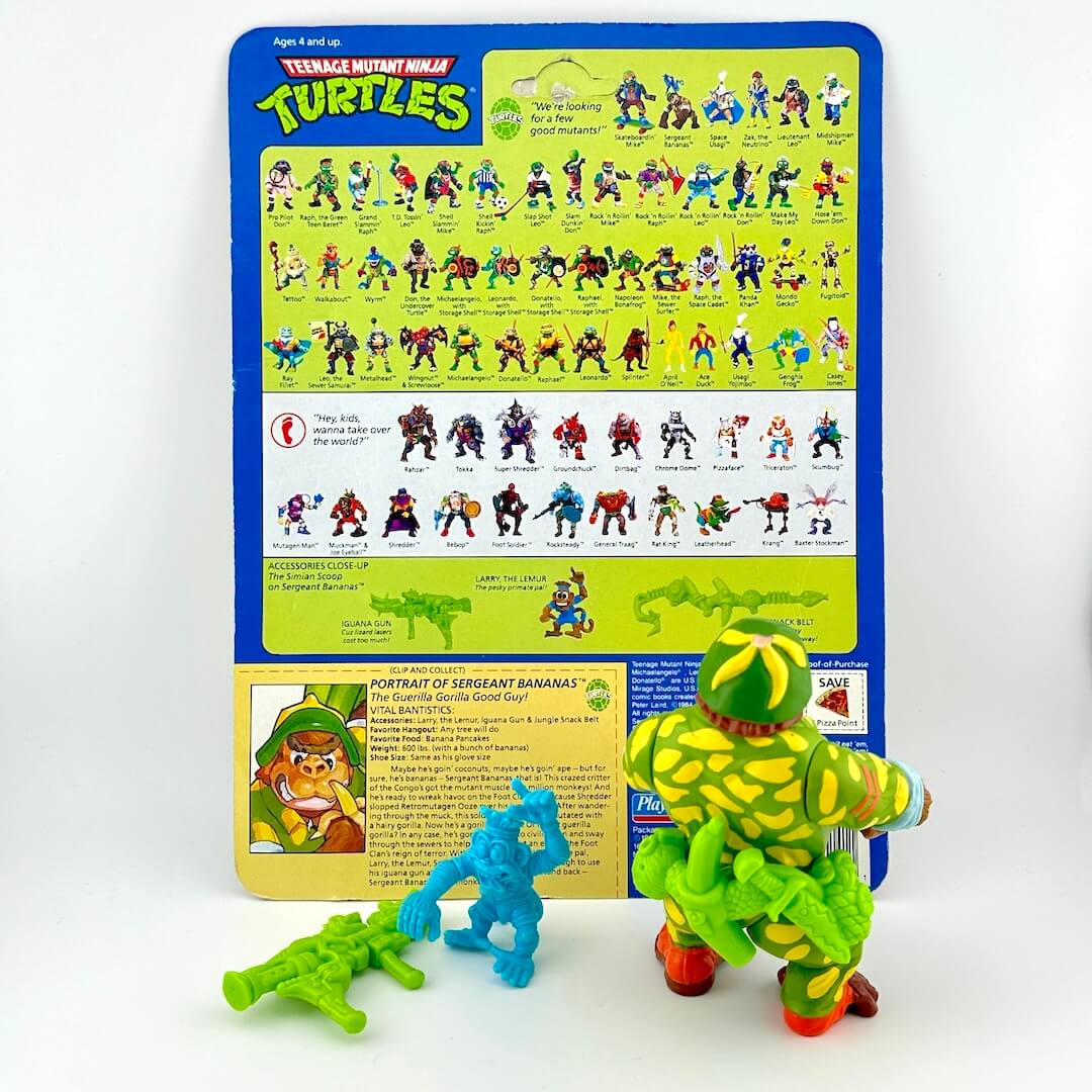 TMNT action figure with card back and accessories against white background.