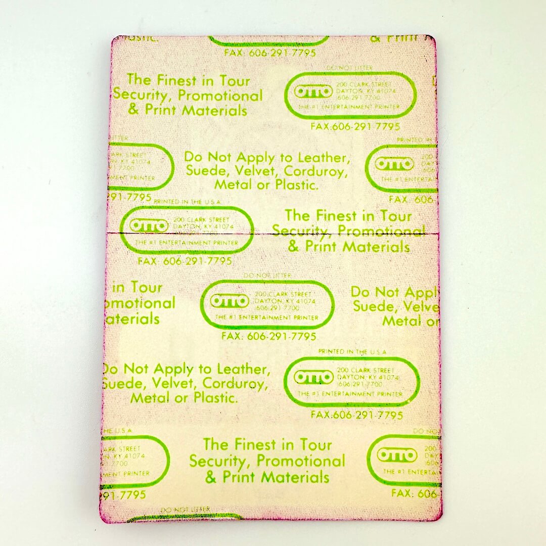 Packaging with green text and branding on a light background