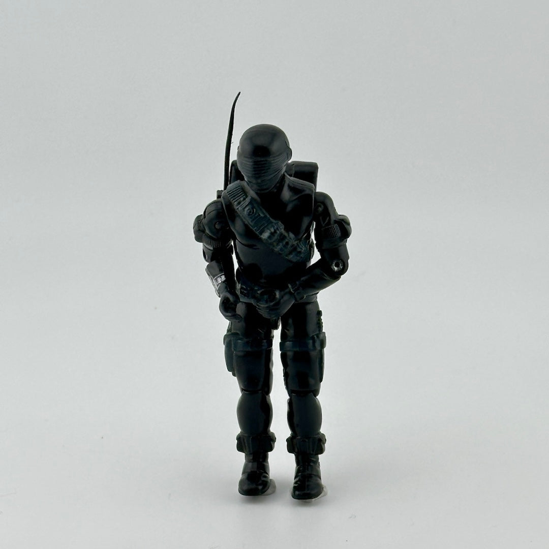 Black ninja action figure with black backpack, & black sword stored on backpack. Front view.