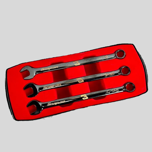 Set of Snap-on wrenches in a red case on a white background