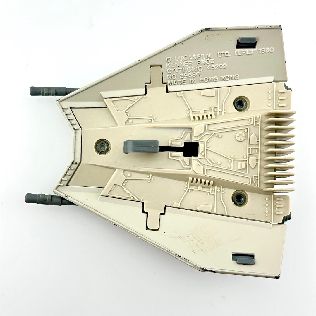 Diecast model of a Star Wars' Snowspeeder on a white background