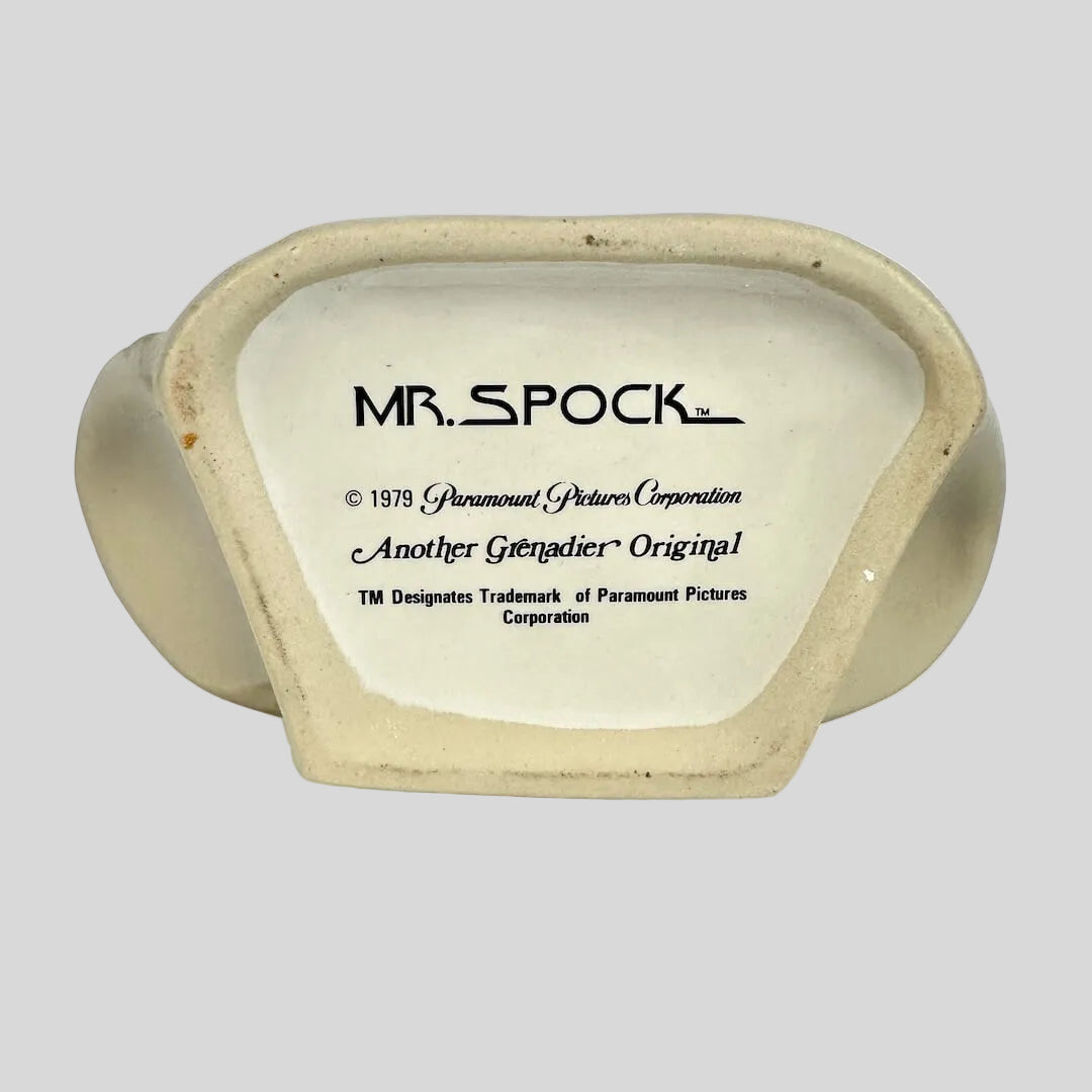 Decorative item with 'MR. SPOCK' branding on a white background
