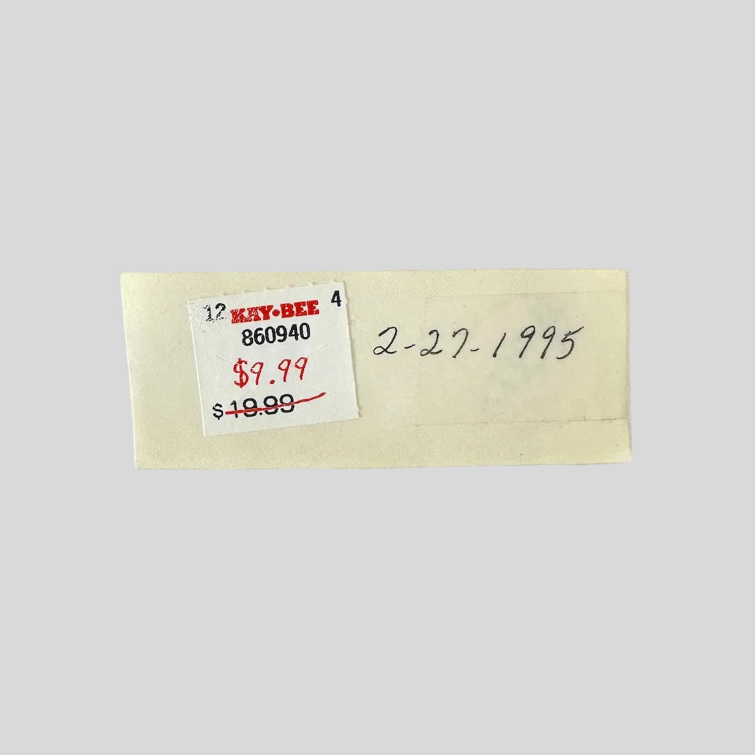 Vintage price tag with product details on a white background