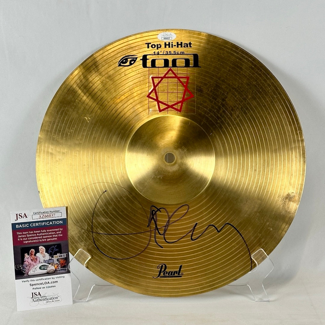 Gold Cymbal with signature and authentication documentation.