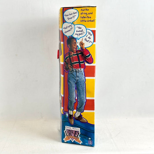 Toy figure in a colorful box with character dialogue on a white background