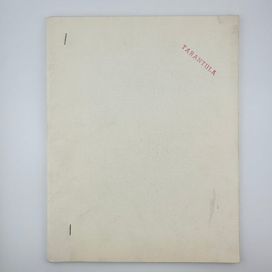 Cream colored paper with two staples one inch from "spine" with red stamped "Tarantula" at top right corner.