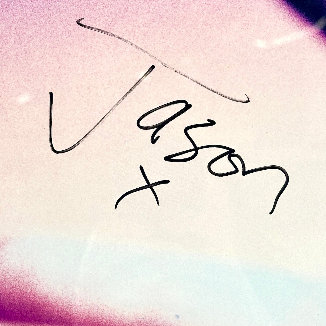 Handwritten name on a colorful gradient background