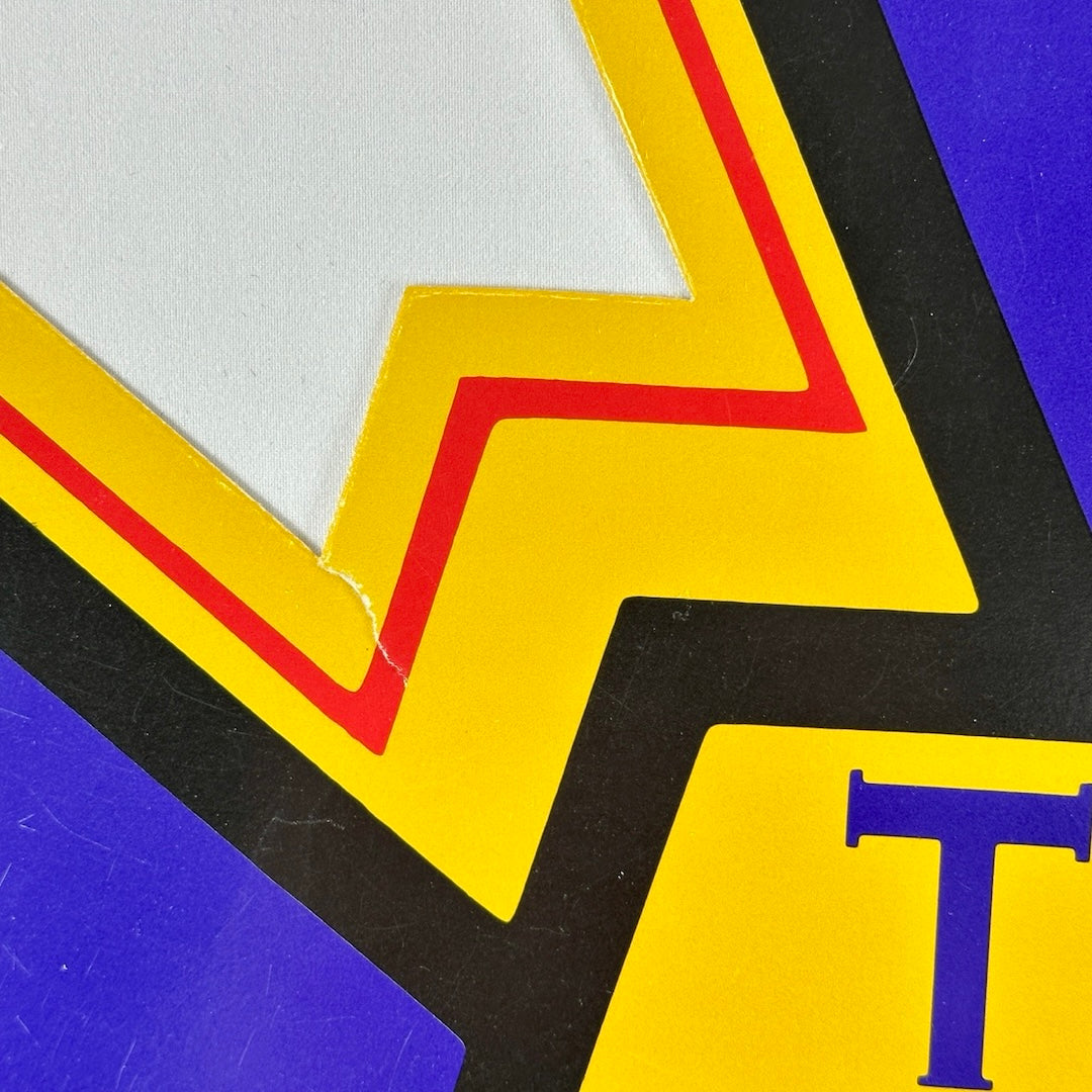 Close up of corner to show some minor tear and condition issues to be expected.