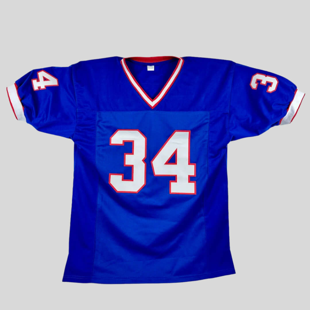 Blue sports jersey with number 34 on a white background