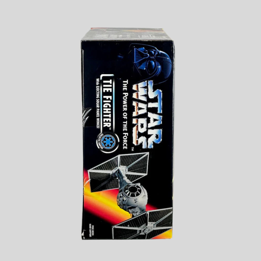 Star Wars toy packaging with TIE Fighter design on a white background