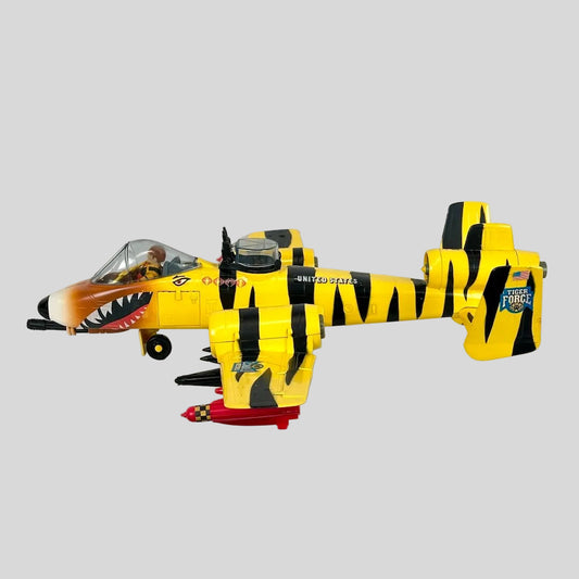 Toy airplane with yellow and black striped design on a white background