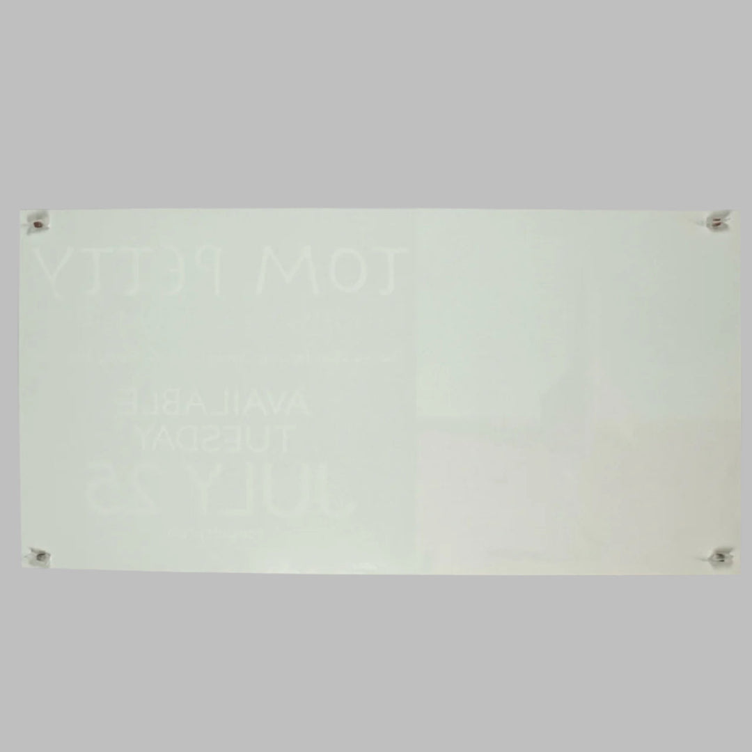 Backside of rectangular white poster showing no damage or wear to poster face or edges.