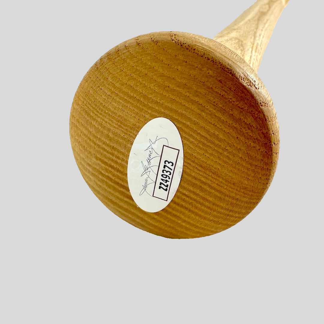Baseball bat knob with JSA authentication sticker with number "ZZ49373"