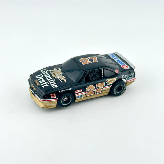Model race car with number 27 on a white background