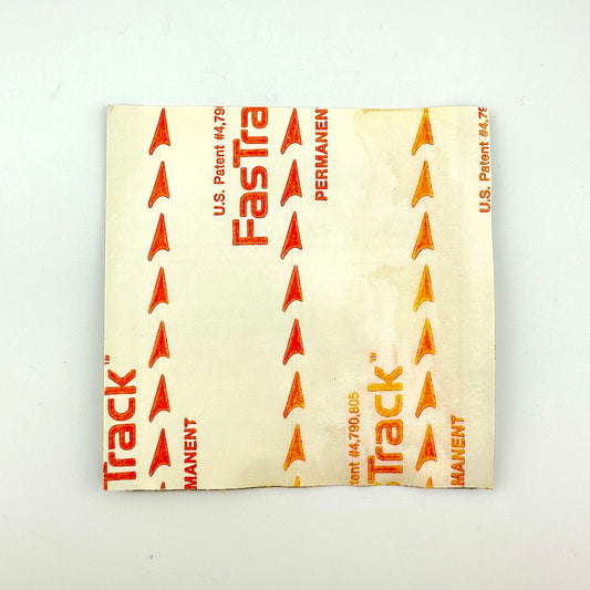 Backside of pass showing intact paper backings and near mint condition.