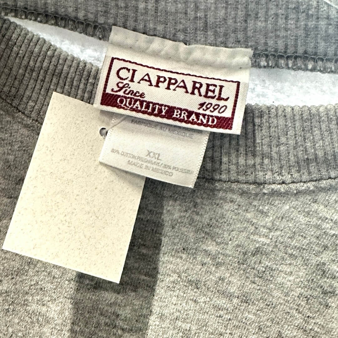 Close up of back neck tag to show manufacturer and size information.