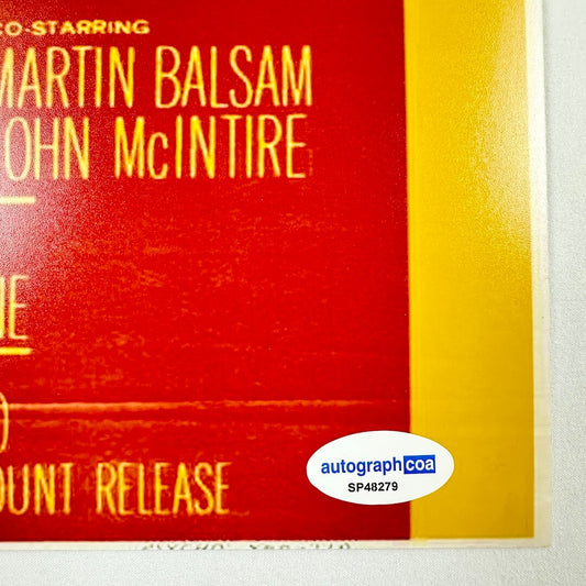 Close-up of authentication sticker in bottom right corner of photo. No visible damage to photo.