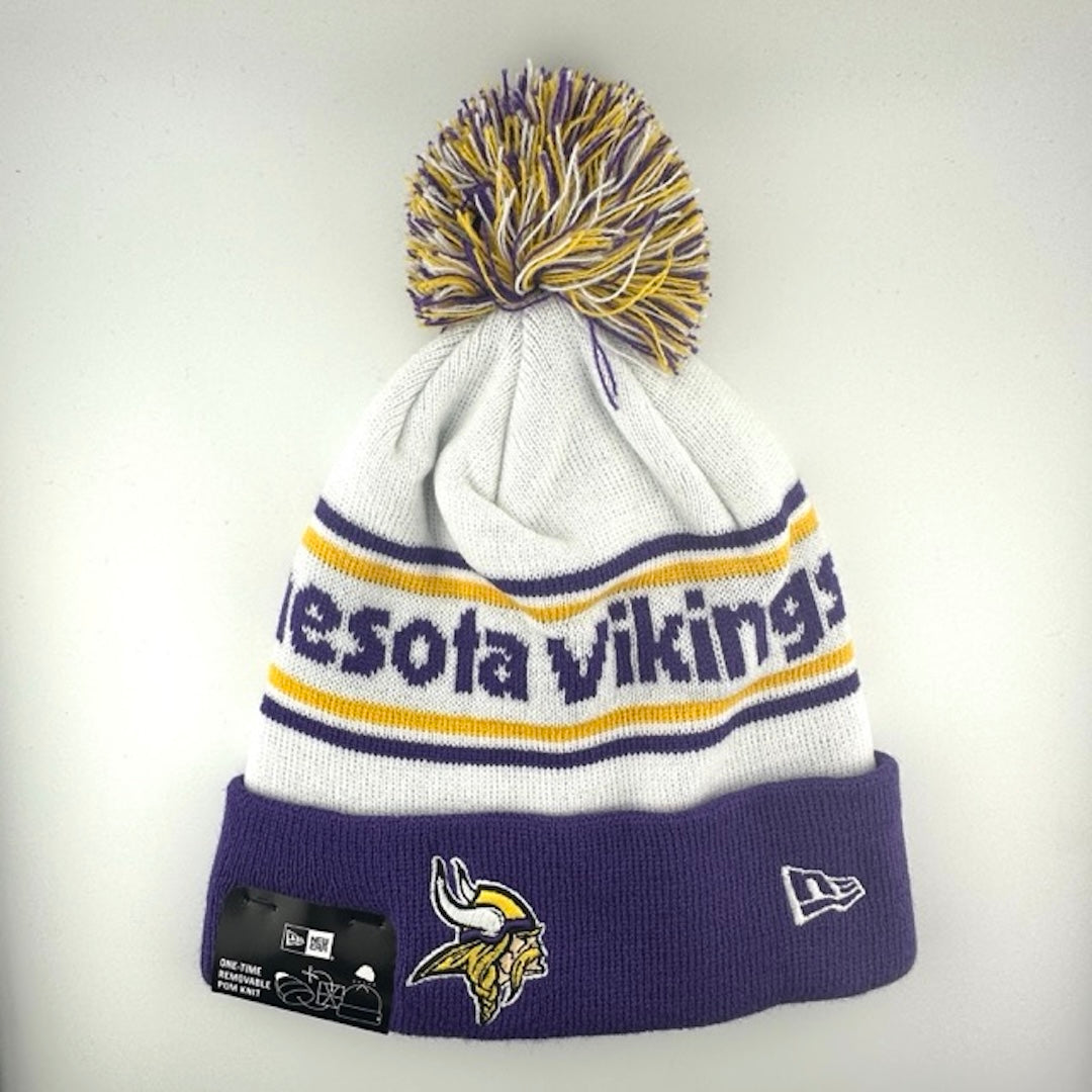 White knit cap with purple/yellow stripes around purple text, Vikings logo in center of purple cuff & purple/yellow/white pom