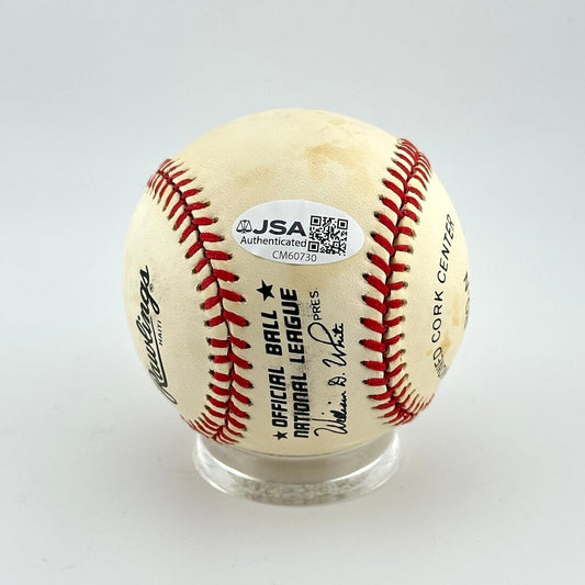Baseball with JSA Authenticator label on a white background