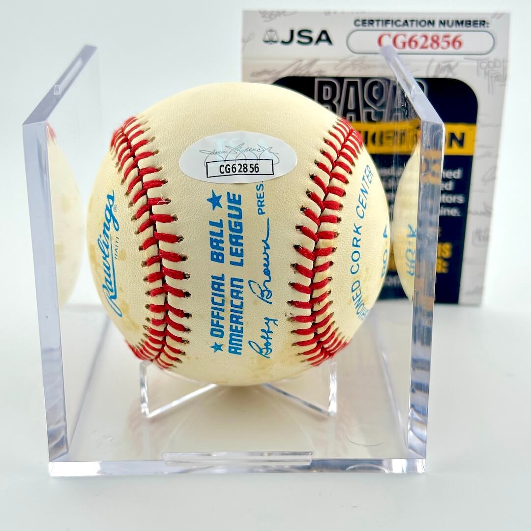 Signed baseball in clear display with JSA sticker and certificate.