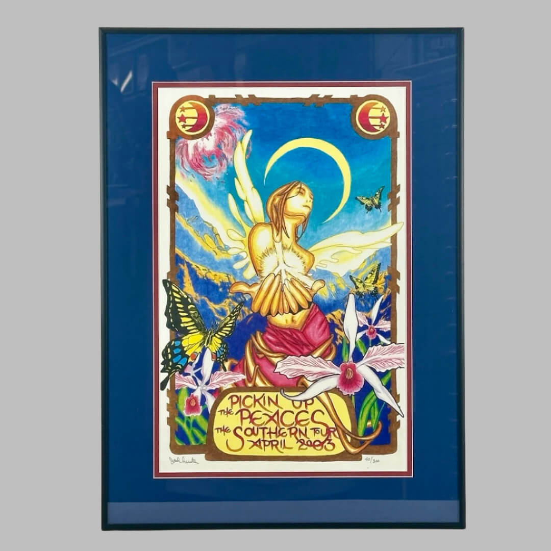 Frame with blue matting around maroon outlining concert poster with fairy holding glowing peace sign as main image.