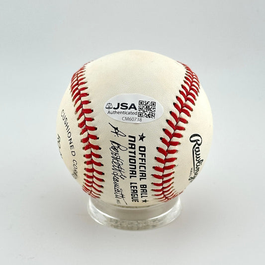 Baseball with JSA authentication label on a white background