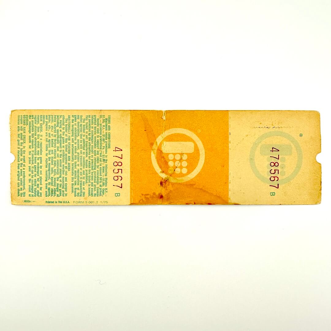 Vintage-style yellow ticket with text and numbers on a white background