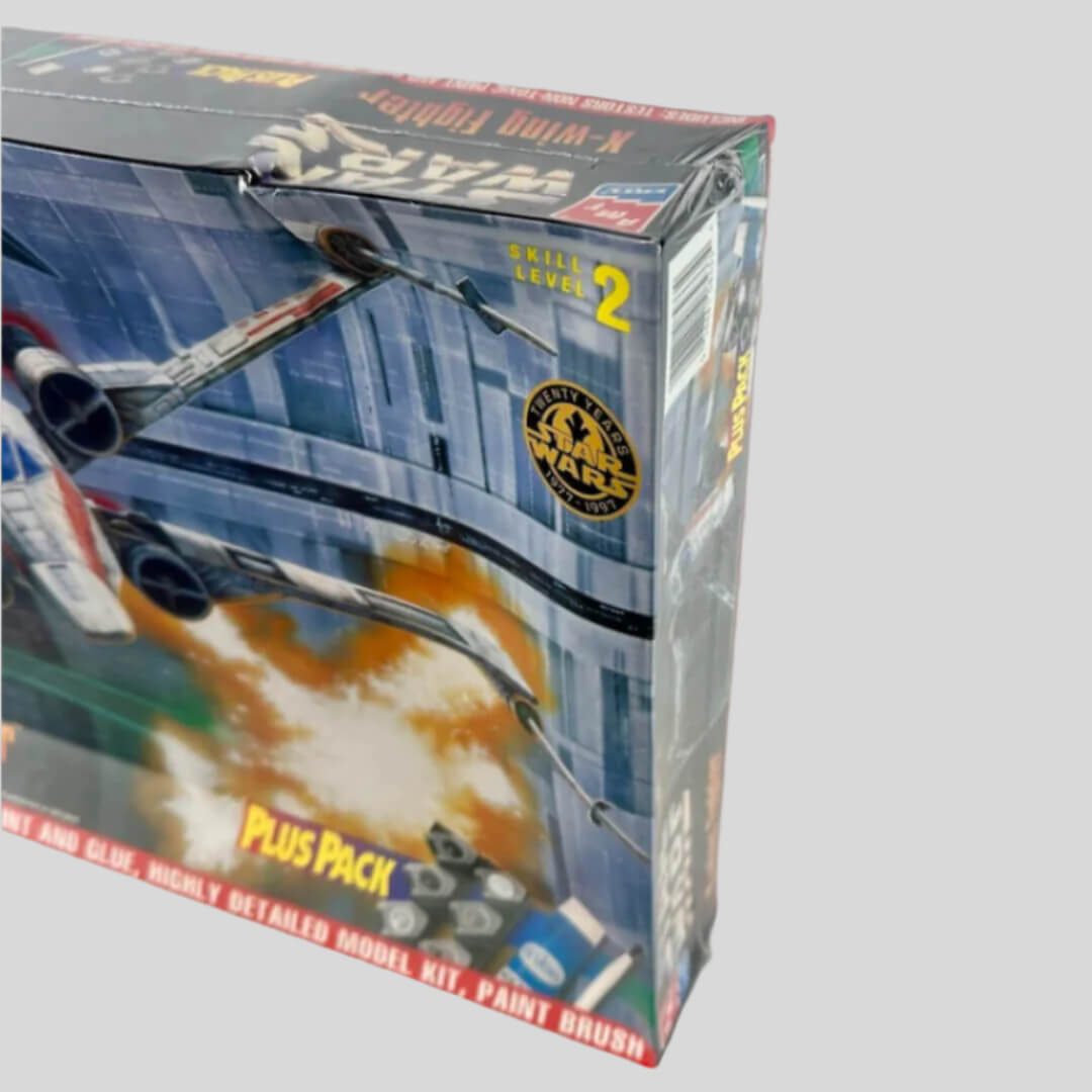 View of right side where the box is caved in under plastic.