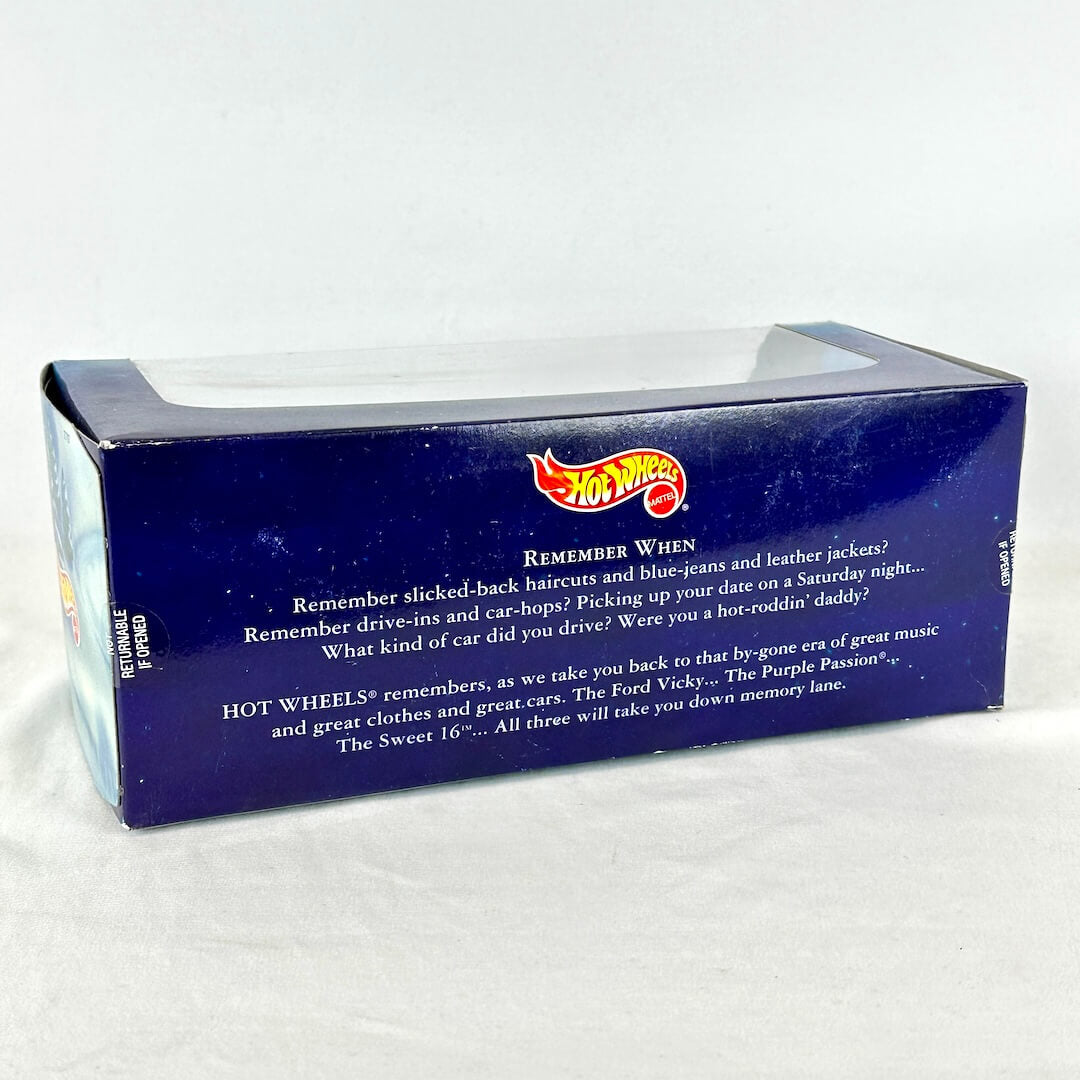 A boxed Hot Wheels collectible item photographed on a white studio surface.