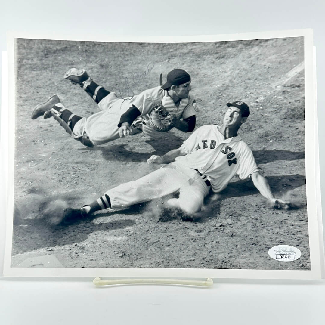 Black and white photo of two baseball players in action on a field, with a JSA authentication label at the bottom.