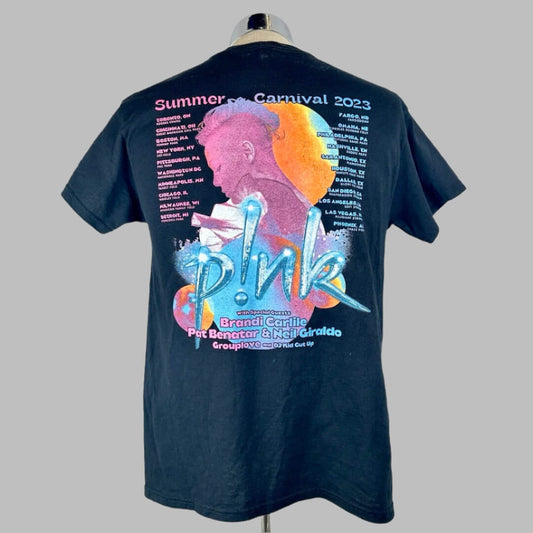 Tour stops listed over each shoulder blade with image of p!nk's silhouette in center, tour information below her.