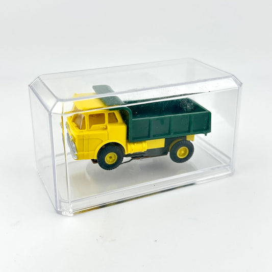Model truck in a clear display case on a white background