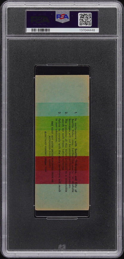 Backside of plastic encased concert ticket with barcode and QR code on banner at top. 