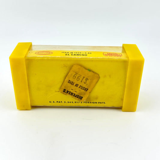 Yellow toy car box with 'El Camino' branding on a white background