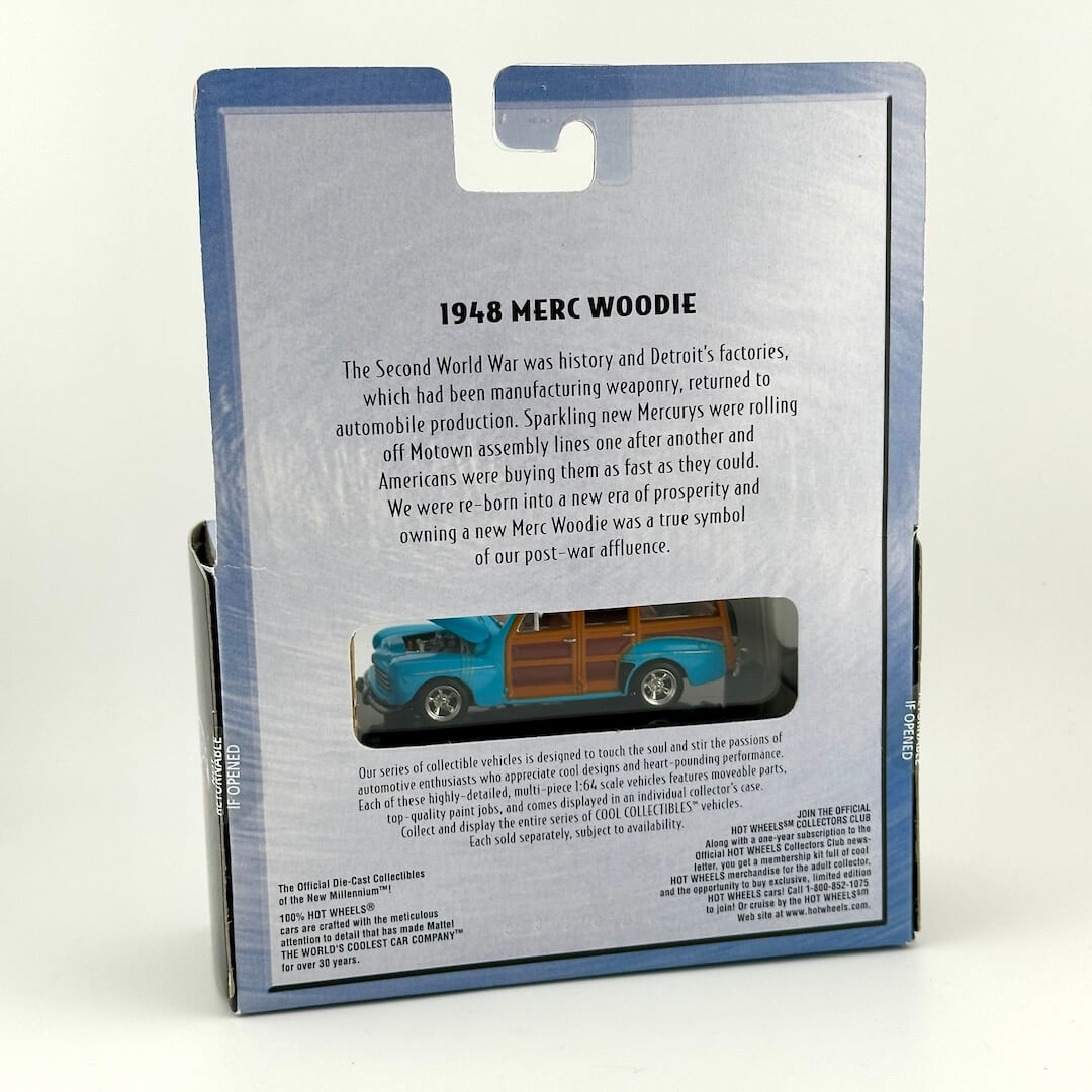 The back of a packaged 1948 Merc Woodie diecast model car, showing printed historical text.