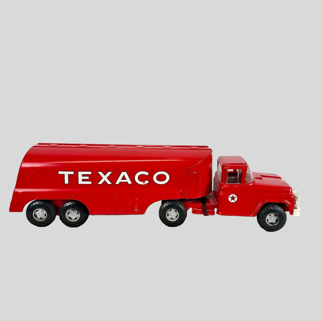 Red Texaco truck model on a white background