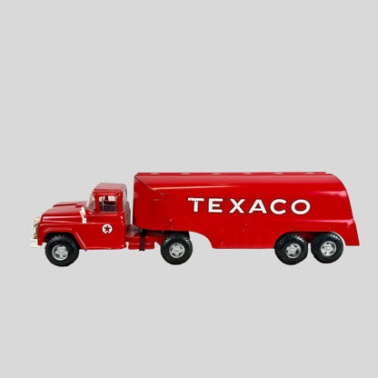Red Texaco truck model on a white background