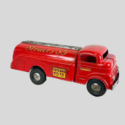 Red toy truck on a white background