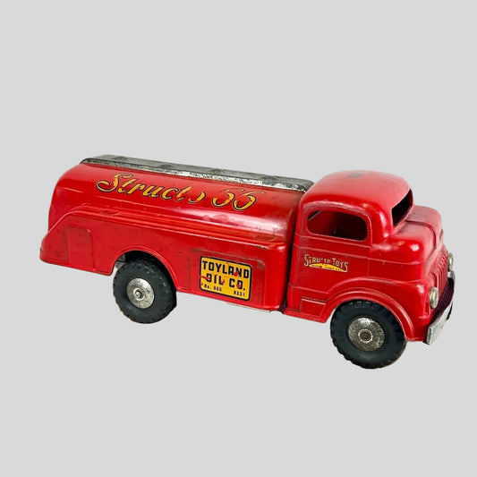Red toy truck on a white background